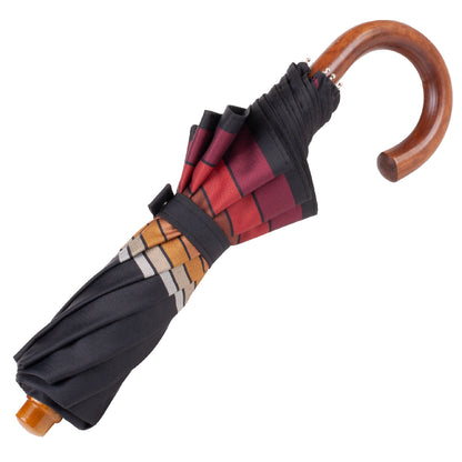 Black folding umbrella with striped edge